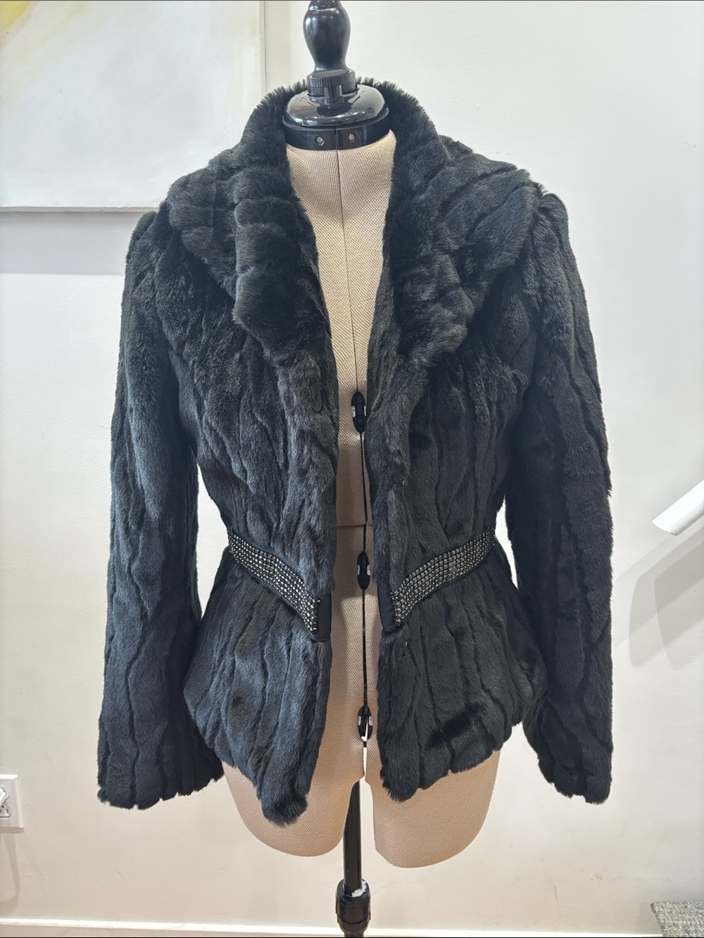 XOXO Black Faux Fur Jacket with Shawl Collar and Studded Waist